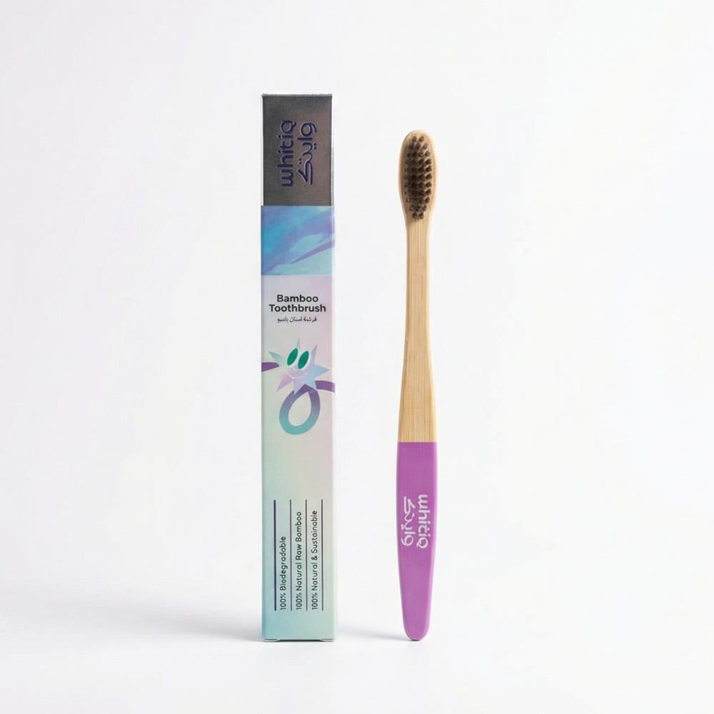 Bamboo Toothbrush (Pink) فرشاة أسنان من الخيزران الطبيعي بلون وردي ناعم.
