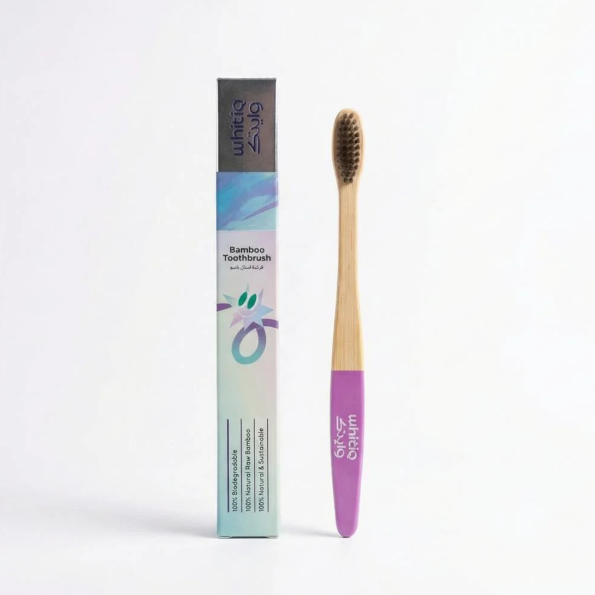Bamboo Toothbrush (Bink) فرشاة أسنان من الخيزران الطبيعي بلون وردي ناعم.