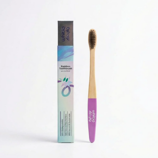 Bamboo Toothbrush (Bink) فرشاة أسنان من الخيزران الطبيعي بلون وردي ناعم.